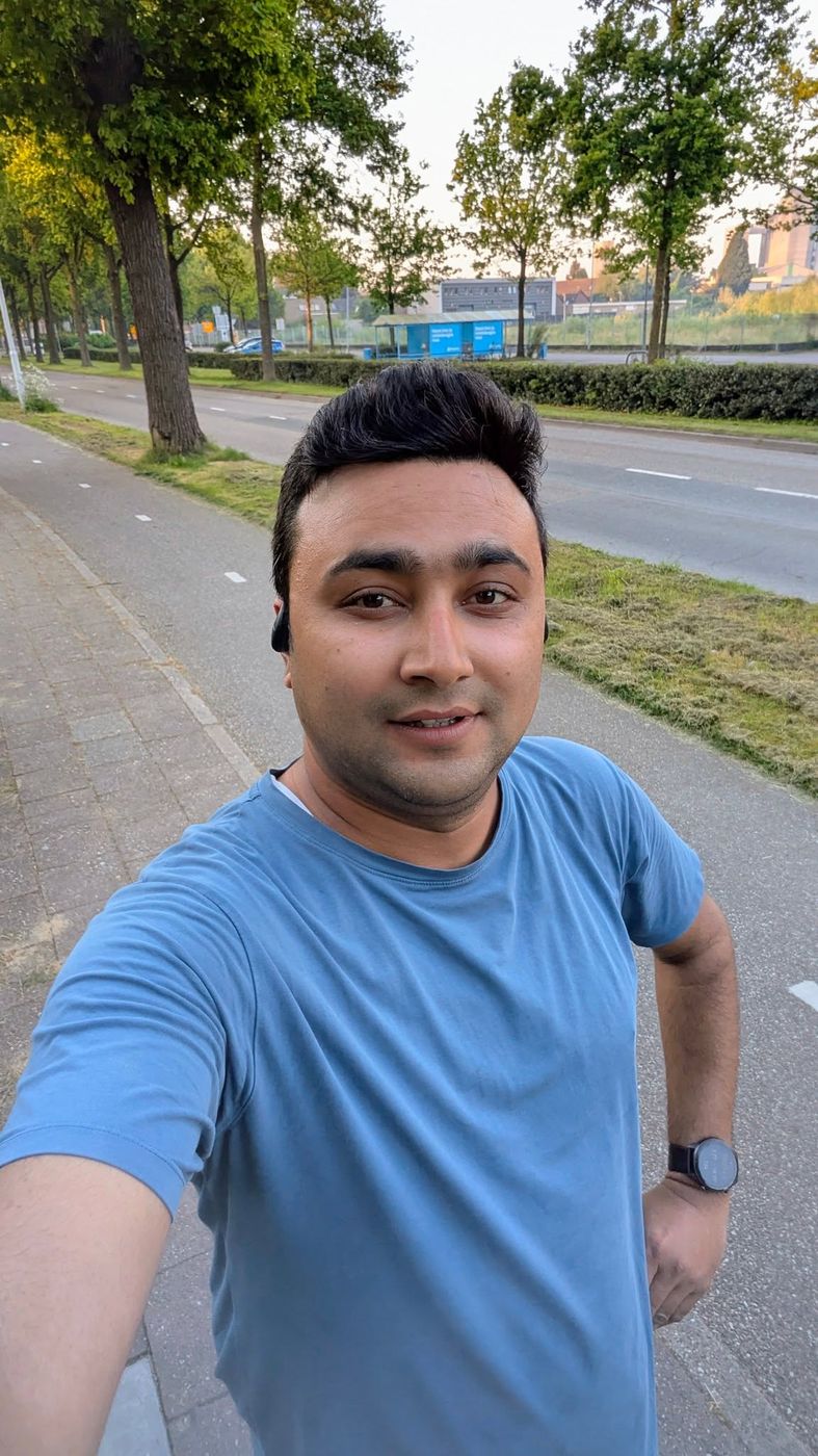 Running selfie at golden hour along a Dutch cycle path