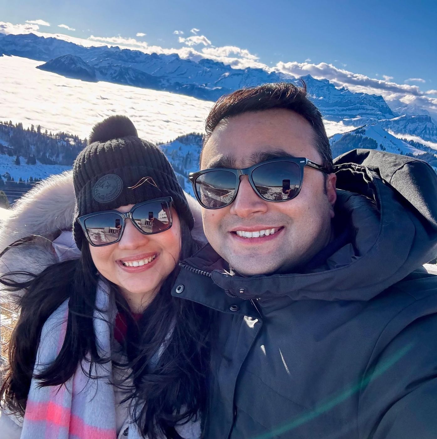 Selfie above the clouds in the snowy Swiss Alps