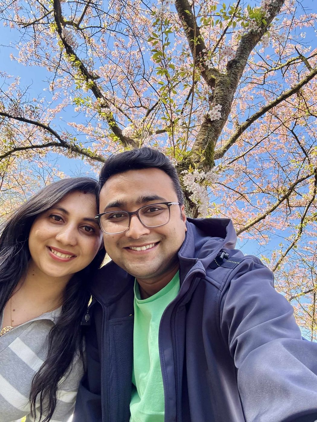 Selfie under a blooming cherry blossom tree